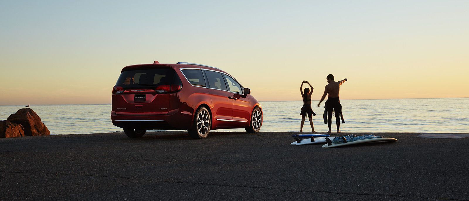 Red Pacifica Rear Exterior Surfing
